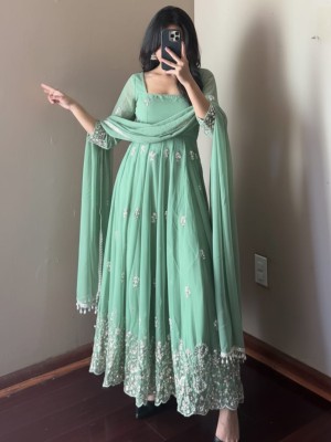 A Graceful Pastel Green Anarkali Suit Full Flare Embroidered Sleeves Heavy border with Pant And Dupatta (Set Of 3)