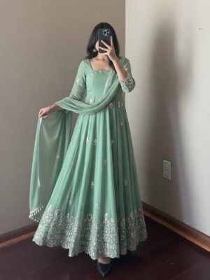 A Graceful Pastel Green Anarkali Suit Full Flare Embroidered Sleeves Heavy border with Pant And Dupatta (Set Of 3)